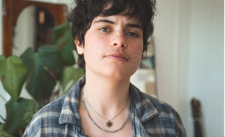 Bells Larsen’s Tour Cancellation Sparks Support Amid Anti-Trans Visa Controversy
