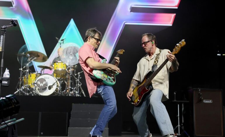 Weezer’s Scott Shriner Hits Coachella Amid Domestic Chaos