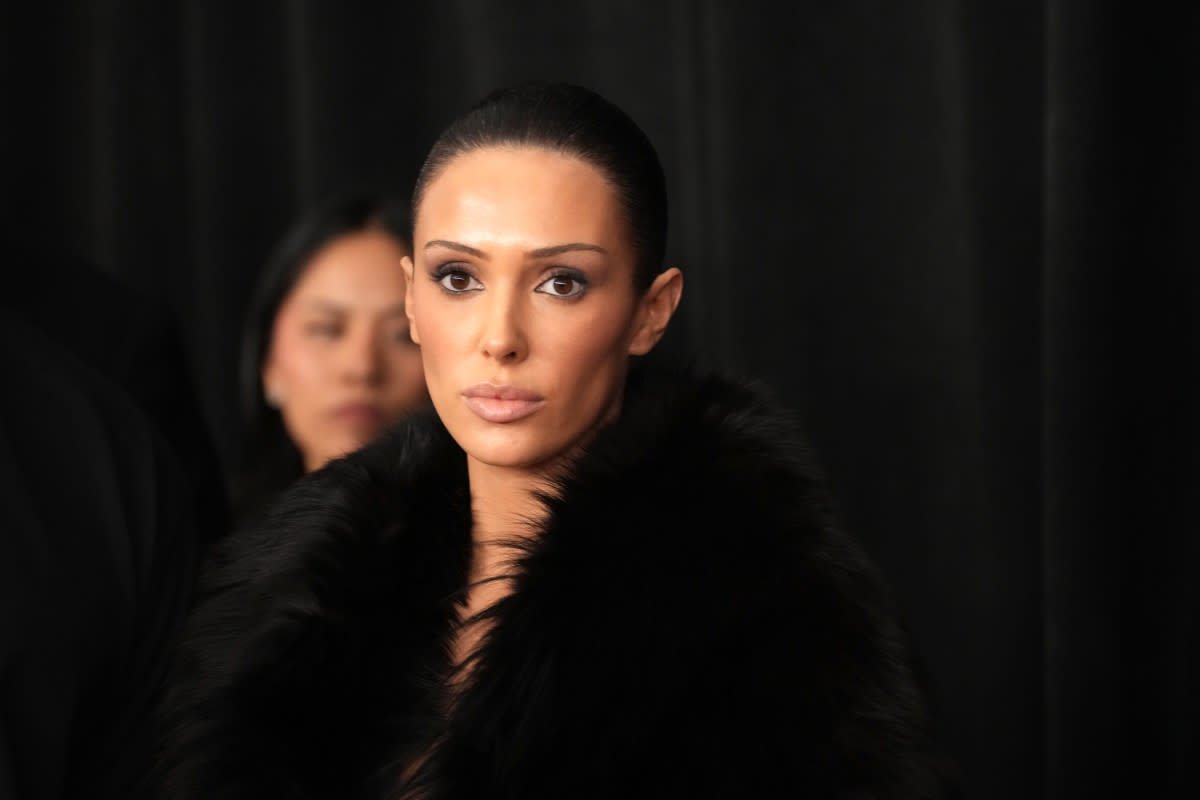 Bianca Censori Dons Sheer Fishnet Dress and Long Locks—Is This Fashion or a Cry for Help?