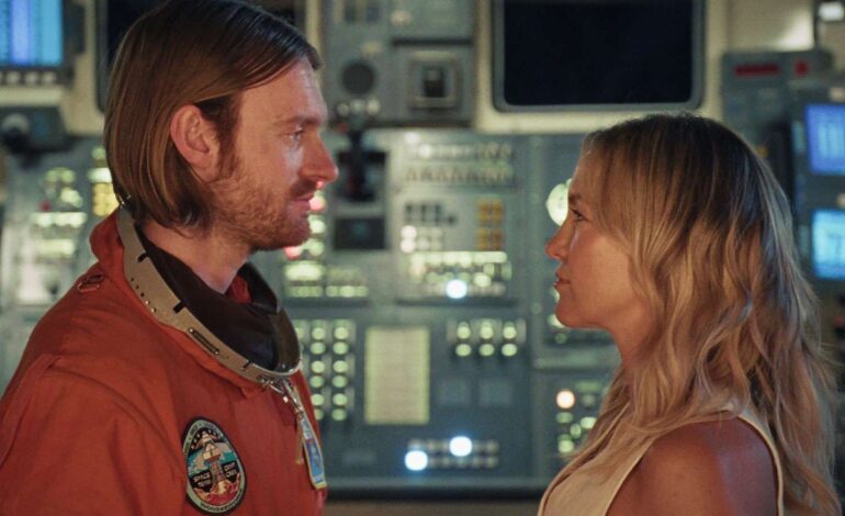 Kate Hudson Soars as Finneas’s Cosmic Crush in “2001” Video