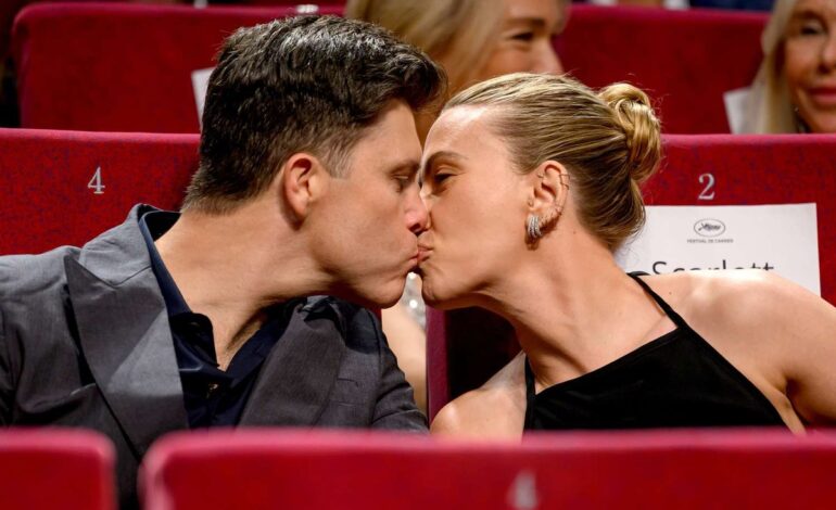 Spark of Connection: Scarlett’s Sweet Red Carpet Smooch with Jonathan Bailey