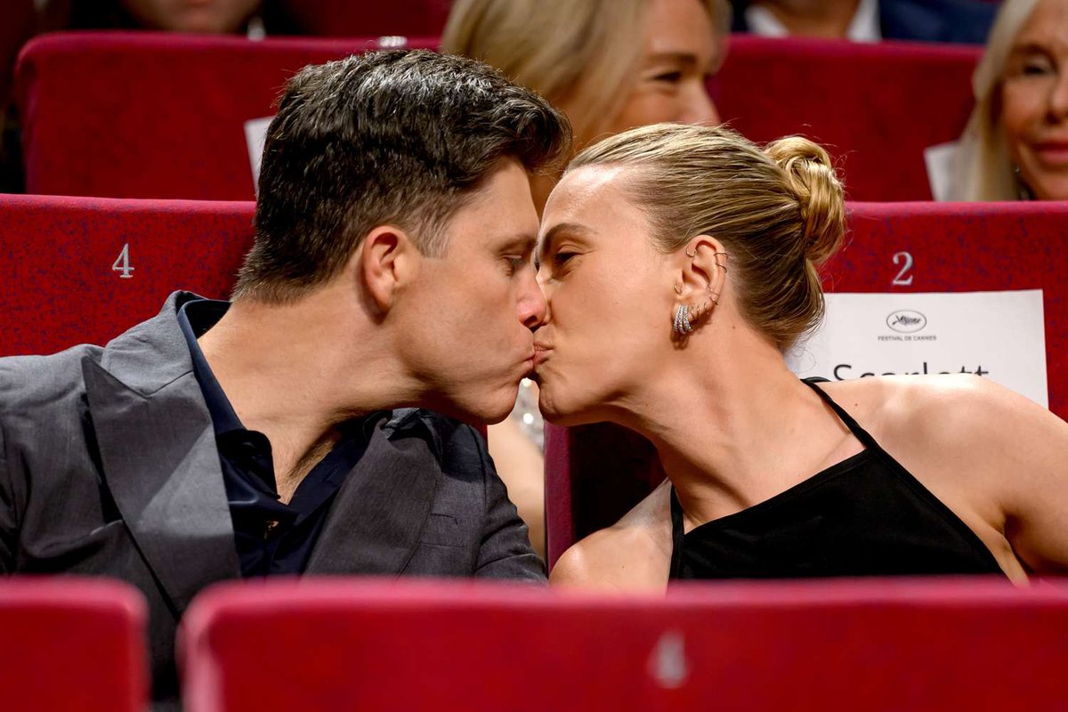 Spark of Connection: Scarlett’s Sweet Red Carpet Smooch with Jonathan Bailey