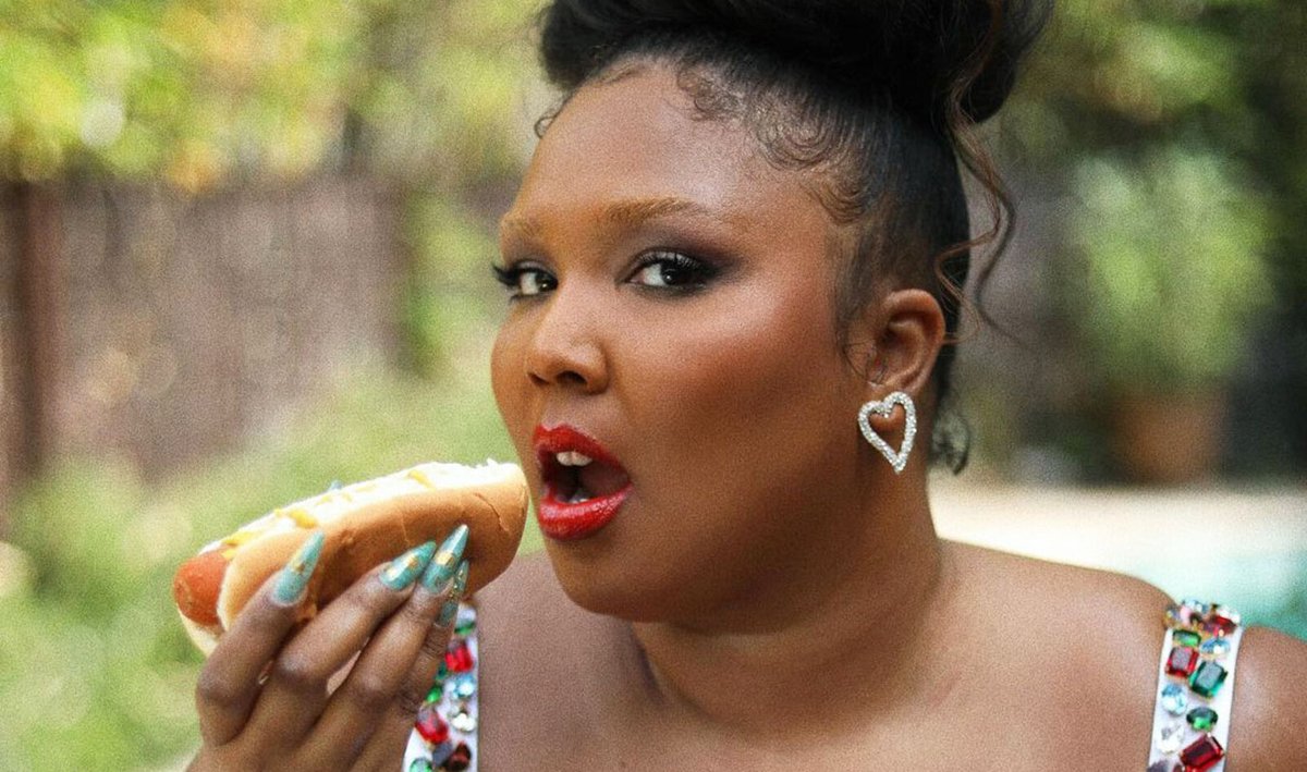 In Fiery Red, Lizzo Declares Hot Dog Hunger