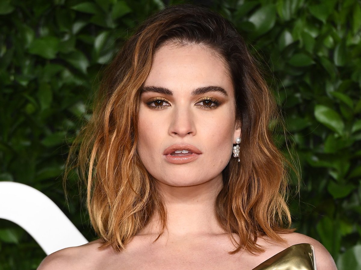 Lily James’ Dark Blue Ombre Unveiled in London Stroll