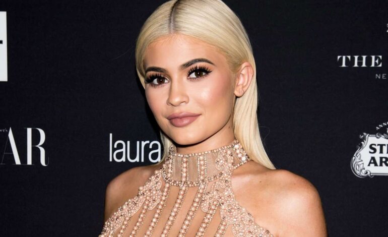 Kylie Jenner Fires Up Fans With Sun-Kissed Abs in Tiny White Crop Top — How Her Day Fueled Beauty Biz and Sisterly Sunshine