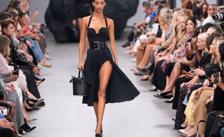 Olivia Wilde Pushes Fashion Boundaries at NYFW with Sheer Moment and PDA Sparks