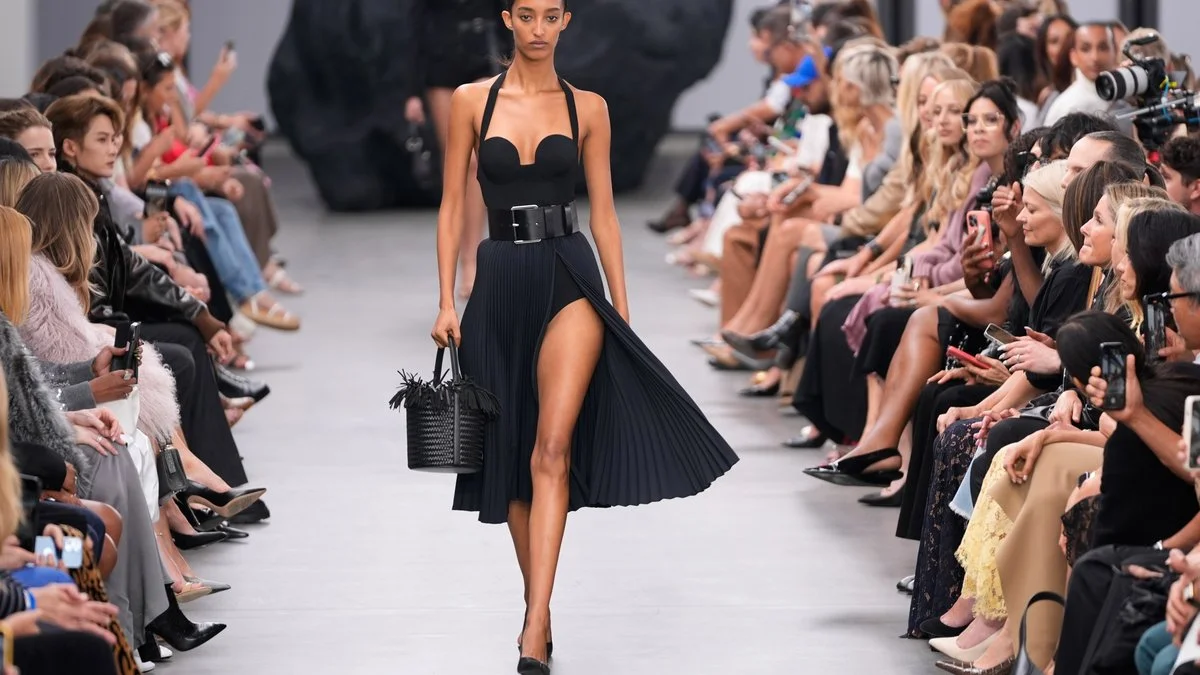 Olivia Wilde Pushes Fashion Boundaries at NYFW with Sheer Moment and PDA Sparks