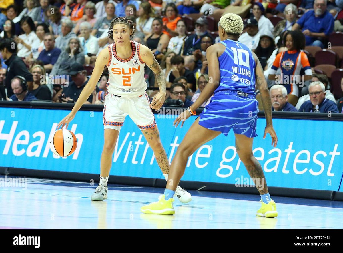 WNBA Stars Courtney Williams and Natisha Hiedeman Make Bold Statement with “Period Red” Hair